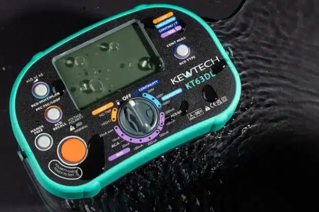 IP54 rated KT63DL in a puddle of water